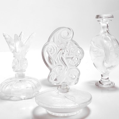 Lot 130 - A group of three Lalique glass scent bottles