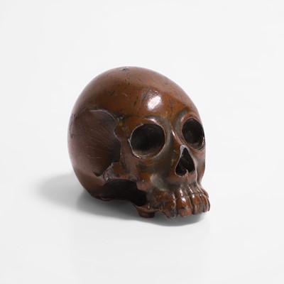 Lot 287 - A Japanese patinated bronzed skull