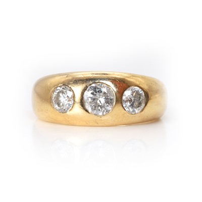 Lot 56 - A 9ct gold diamond three stone ring