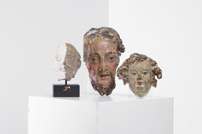 Lot 531 - A carved and painted head of Christ