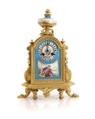 Lot 213 - A porcelain and gilt ormolu mantle clock