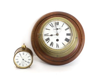 Lot 196 - A brass and mahogany mounted ships clock