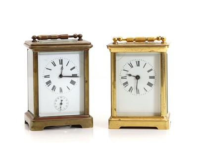 Lot 209 - Two similar brass carriage timepieces