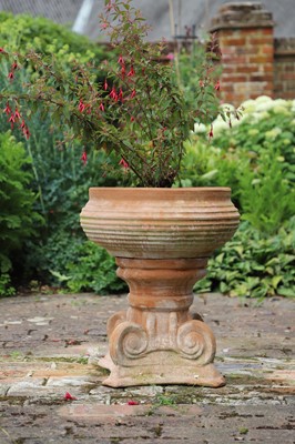 Lot 488 - A pair of modern clay pedestal urns