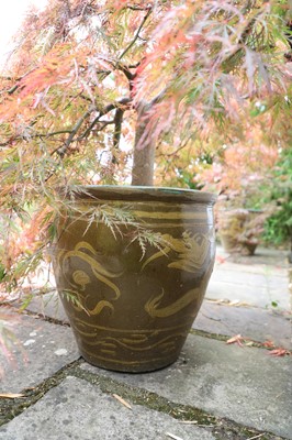 Lot 492 - A series of six modern Chinese glazed planters