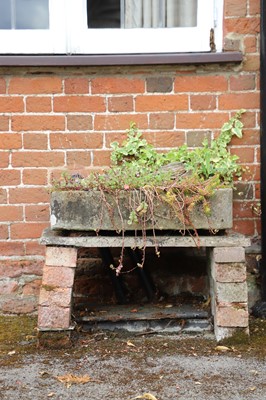 Lot 450 - A series of three small stone troughs