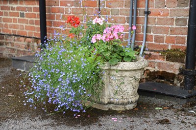 Lot 510 - A pair of moulded composite stone planters