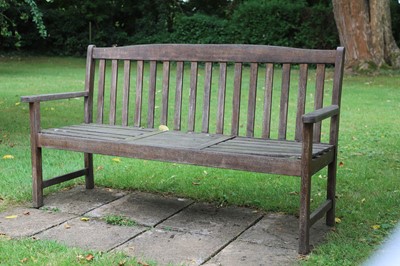 Lot 477 - A teak garden bench