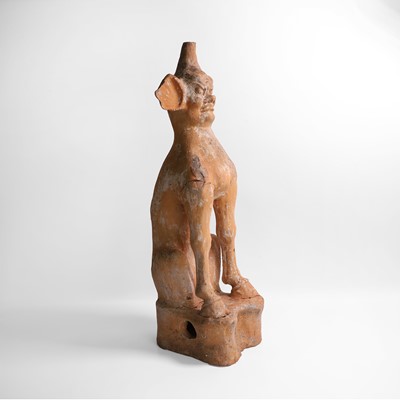 Lot 4 - A Chinese earthenware tomb guardian beast