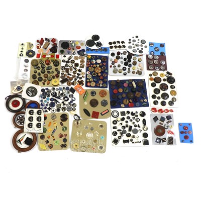 Lot 598 - A collection of celluloid and wood buttons