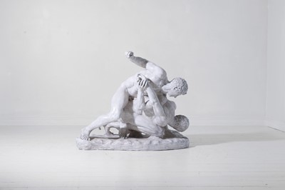 Lot 397 - A plaster figure group