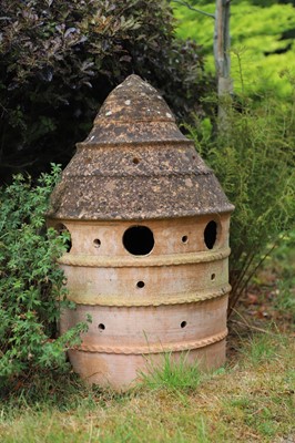 Lot 493 - A modern terracotta rhubarb forcing pot
