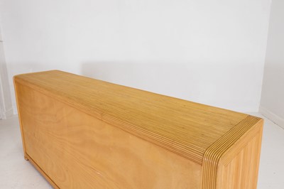 Lot 563 - A rattan faux bamboo sideboard