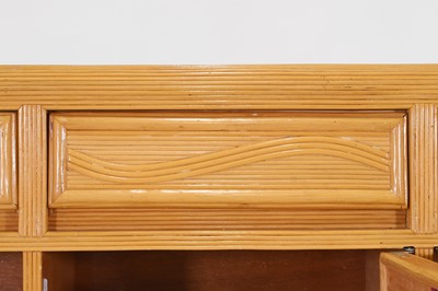 Lot 563 - A rattan faux bamboo sideboard