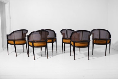 Lot 559 - A set of six stained wooden and caned dining chairs by Paolo Moschino