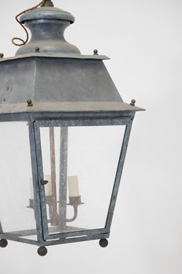 Lot 537 - A pair of patinated metal lanterns
