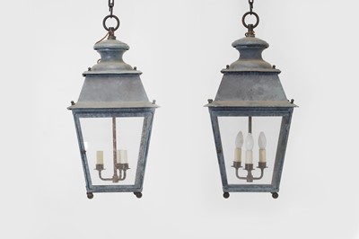 Lot 537 - A pair of patinated metal lanterns