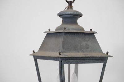 Lot 537 - A pair of patinated metal lanterns