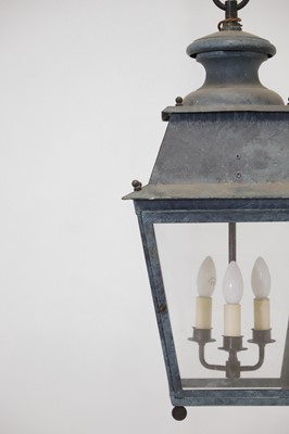 Lot 537 - A pair of patinated metal lanterns