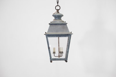 Lot 537 - A pair of patinated metal lanterns