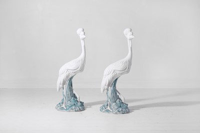 Lot 556 - A pair of glazed stoneware heron