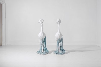 Lot 556 - A pair of glazed stoneware heron