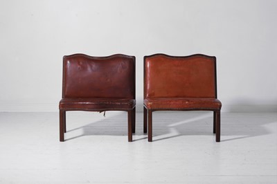 Lot 550 - A pair of walnut and leather hall benches