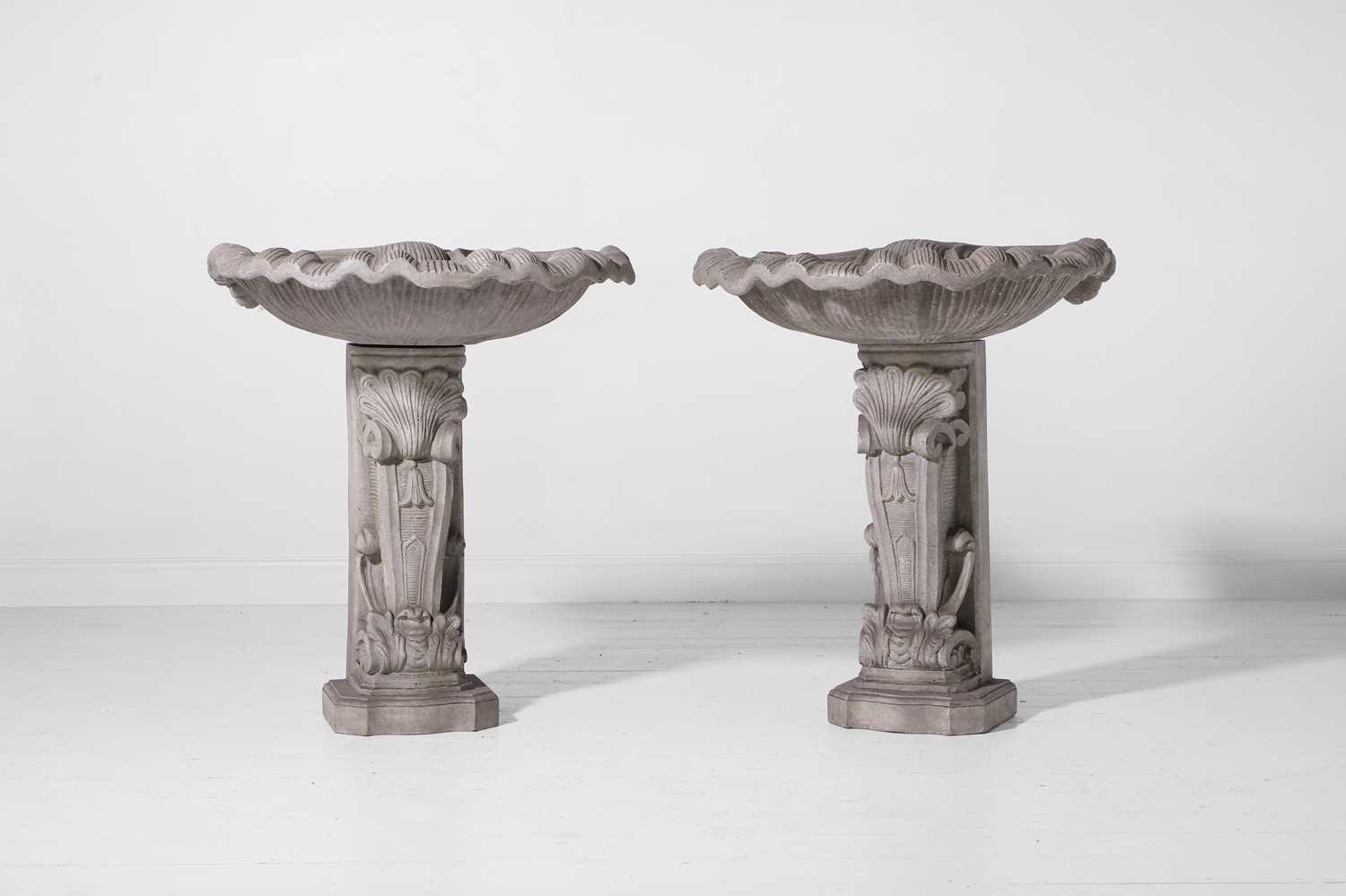 Lot 565 - A pair of baroque-style painted wooden shell pedestals