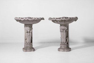 Lot 565 - A pair of baroque-style painted wooden shell pedestals