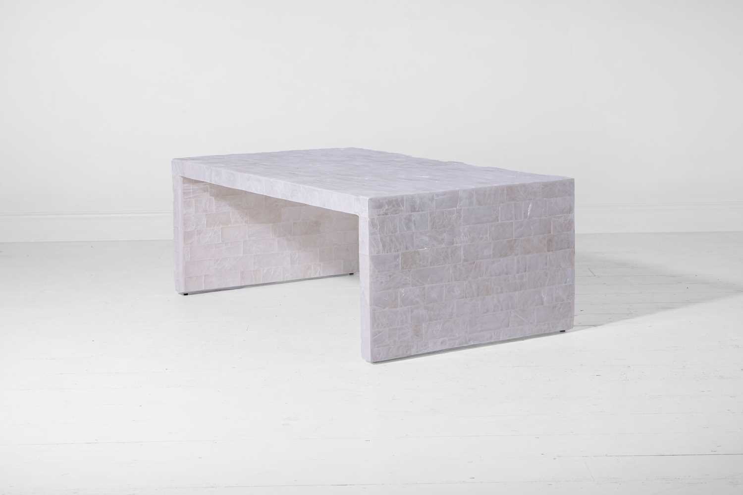 Lot 567 - A gypsum and pewter coffee table