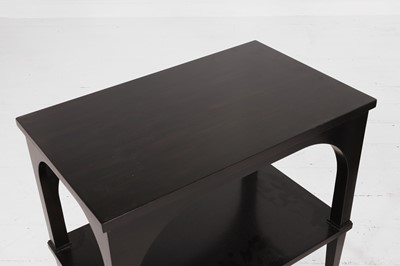 Lot 539 - A pair of ebonised wooden 'Primavera' side tables by Paolo Moschino