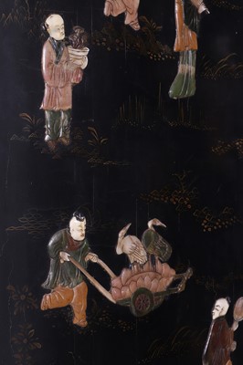 Lot 554 - An export black lacquer, hardstone and ivory-inlaid folding screen