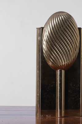 Lot 558 - A set of three nickel and brass vases