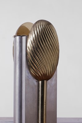 Lot 558 - A set of three nickel and brass vases