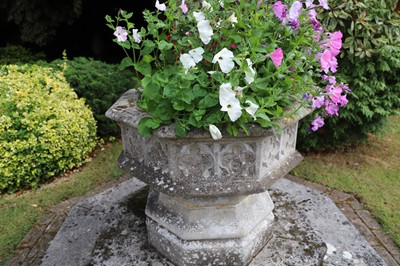 Lot 495 - A modern composite stone octagonal font