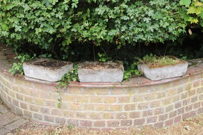 Lot 449 - A series of three small composite stone troughs