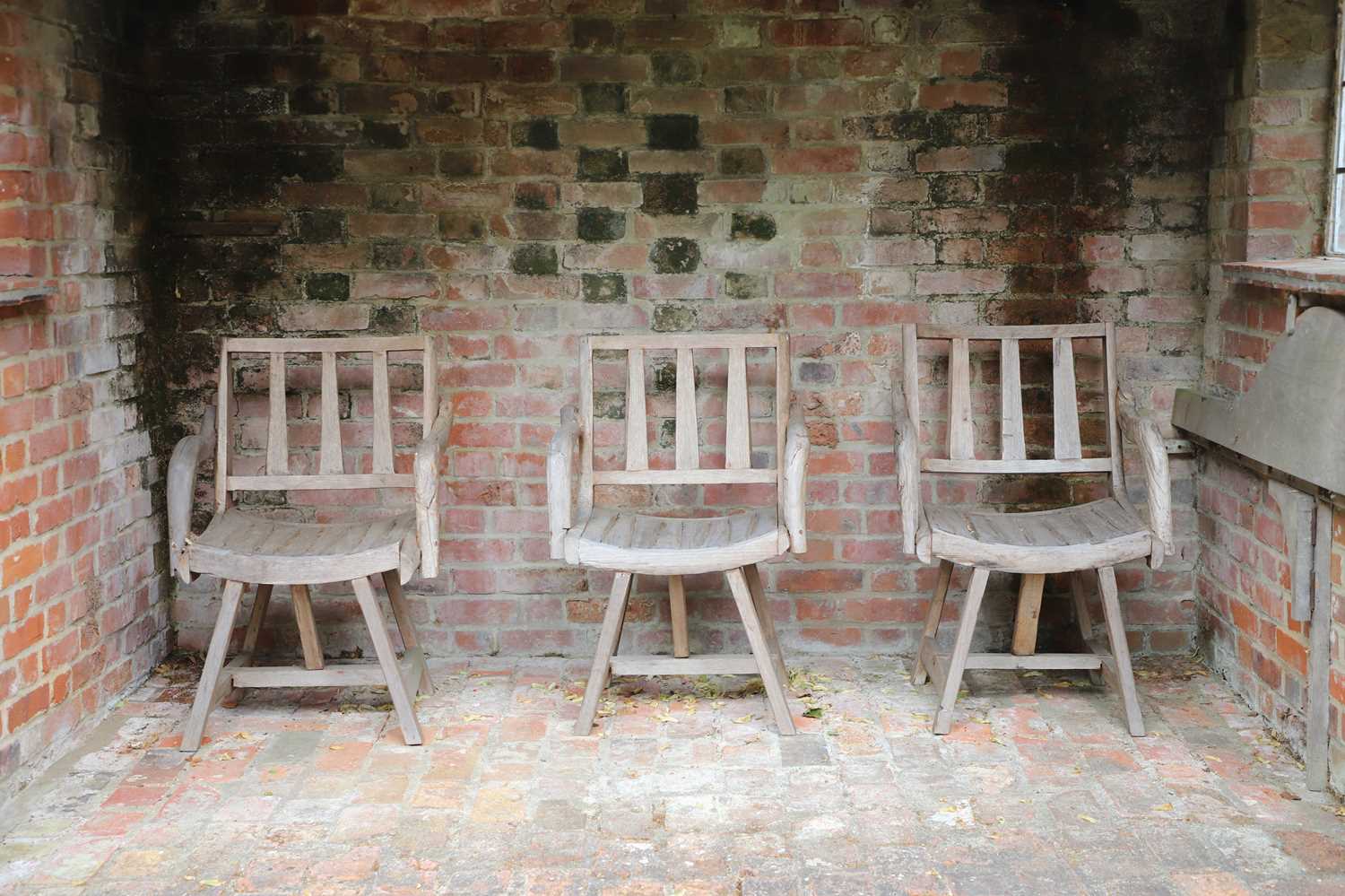 Lot 483 - Three Indonesian driftwood garden armchairs