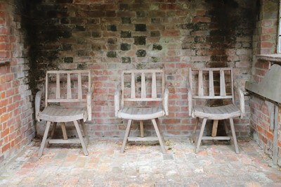 Lot 483 - Three Indonesian driftwood garden armchairs