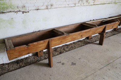 Lot 486 - A pair of elm cow byre mangers