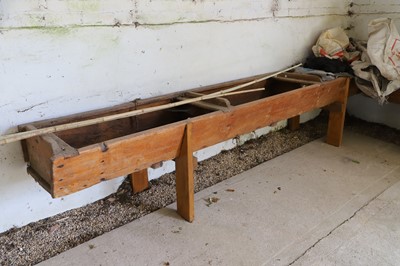 Lot 485 - A pair of elm cow byre mangers