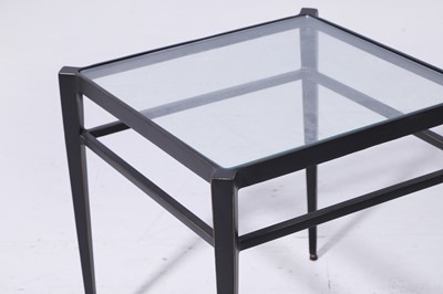 Lot 560 - A pair of small patinated brass and glass ‘Lescot’ side tables by Paolo Moschino