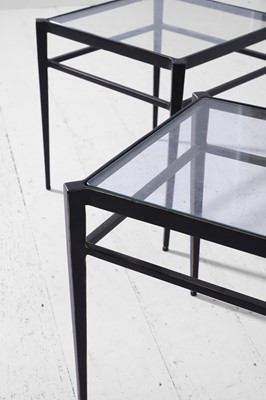 Lot 560 - A pair of small patinated brass and glass ‘Lescot’ side tables by Paolo Moschino