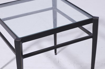 Lot 560 - A pair of small patinated brass and glass ‘Lescot’ side tables by Paolo Moschino