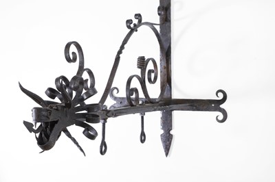 Lot 422 - A wrought-iron wall bracket