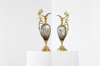 Lot 509 - A pair of ormolu-mounted porcelain ewers