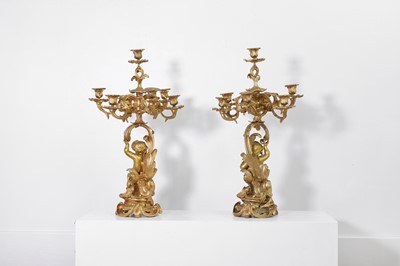 Lot 240 - A pair of Louis XVI-style ormolu candelabra