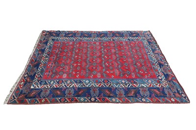 Lot 421 - A Kazak wool carpet
