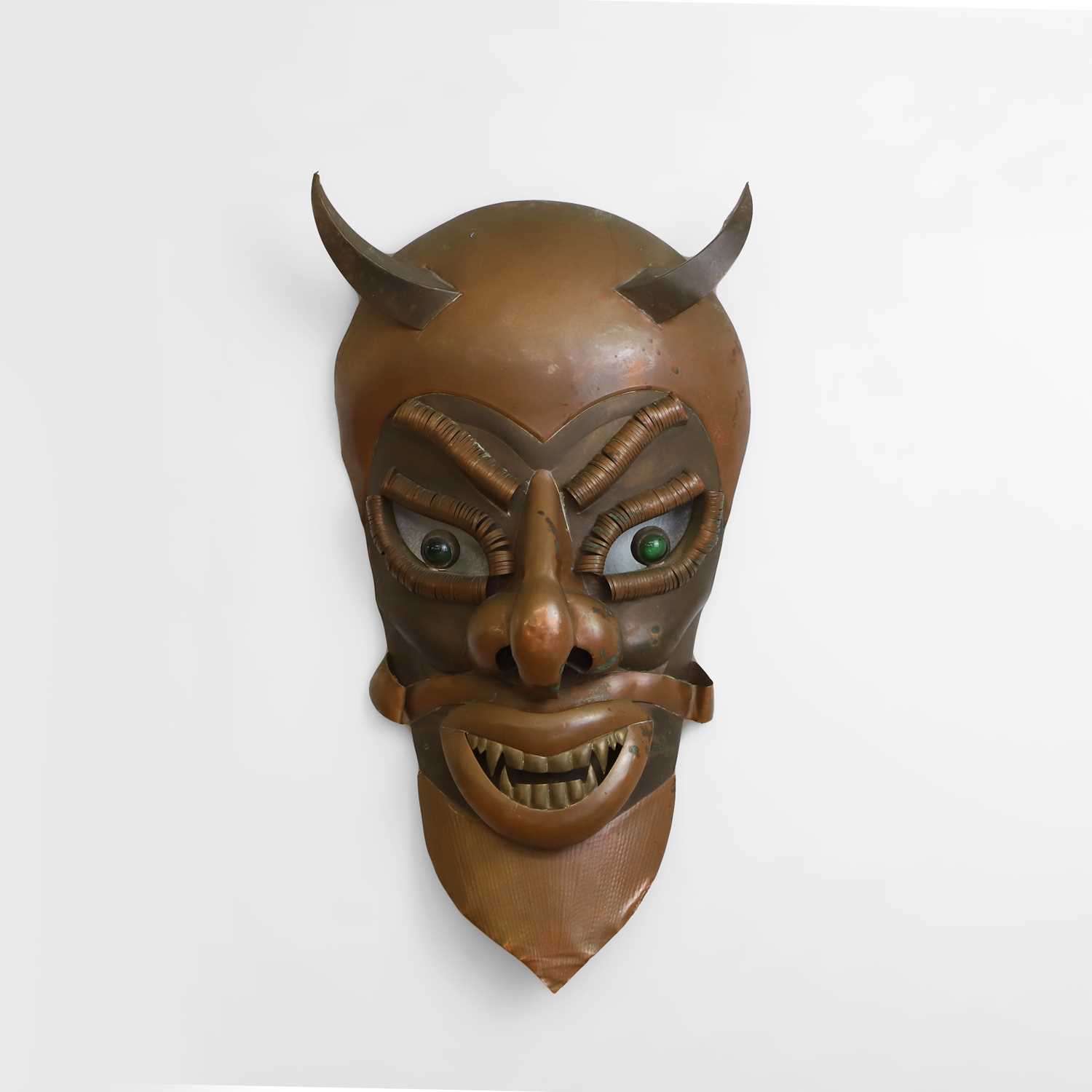 Lot 51 - A folk art devil mask