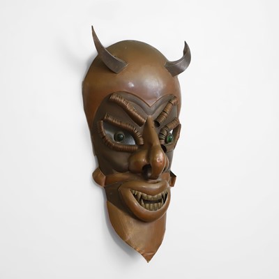 Lot 51 - A folk art devil mask