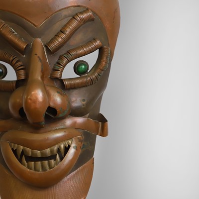 Lot 51 - A folk art devil mask